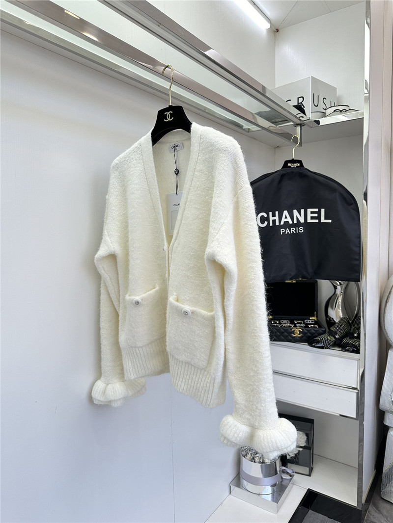 Ch**el white v-neck cardigan with floral cuffs