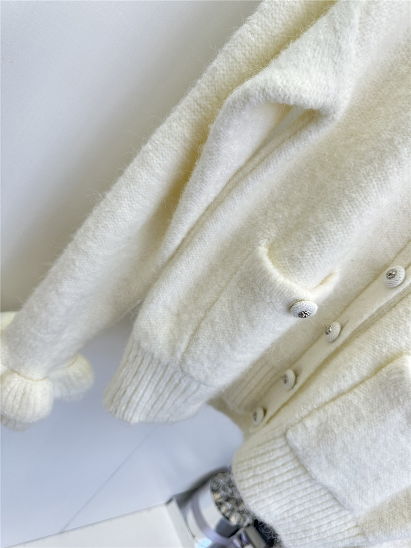 Ch**el white v-neck cardigan with floral cuffs