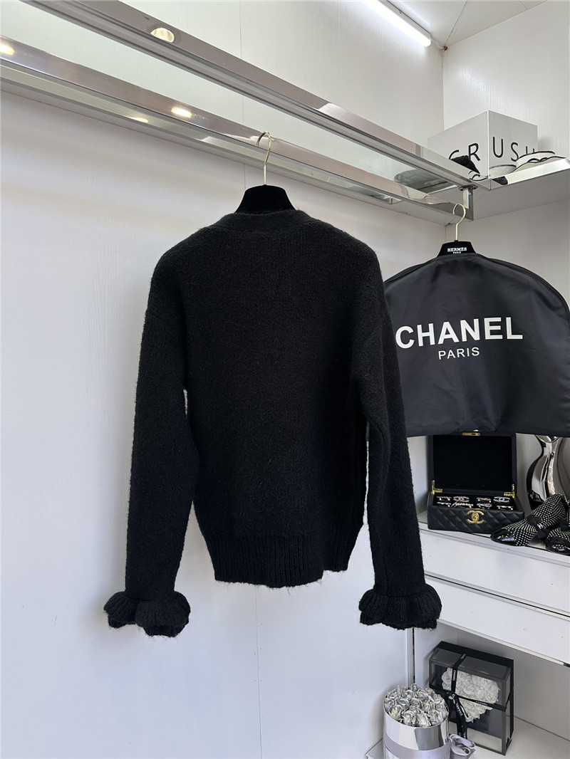 Ch**el white v-neck cardigan with floral cuffs