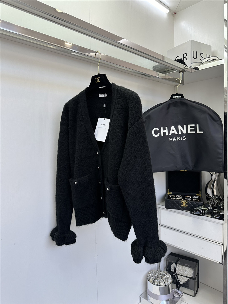 Ch**el white v-neck cardigan with floral cuffs