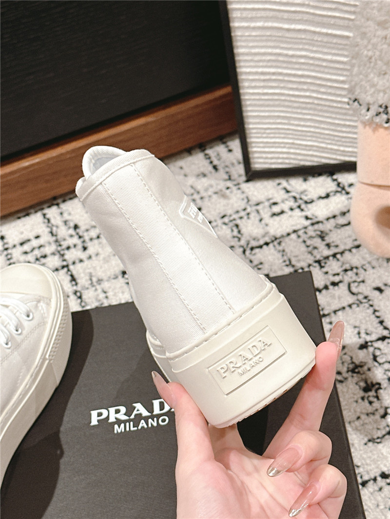 Pra*a white high-top canvas sneakers