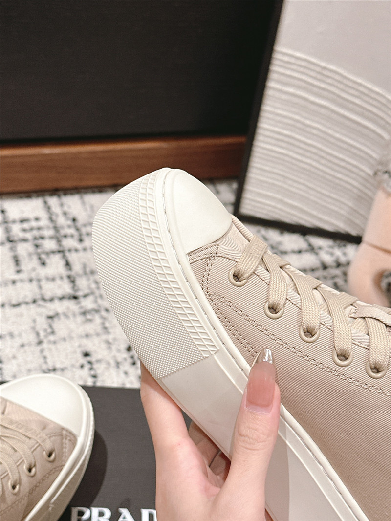 Pra*a beige high-top canvas sneakers