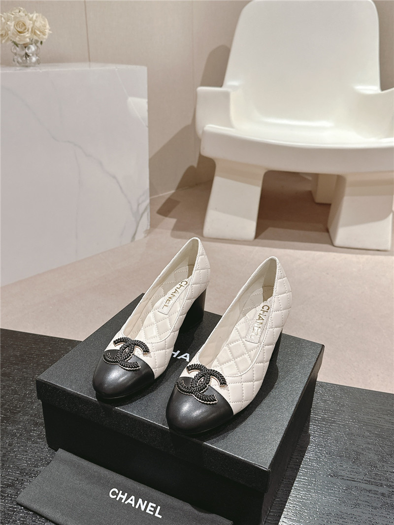 Ch**el white/black quilted leather cap toe pumps