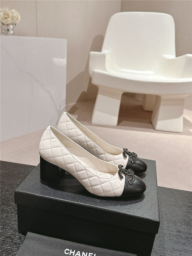 Ch**el white/black quilted leather cap toe pumps