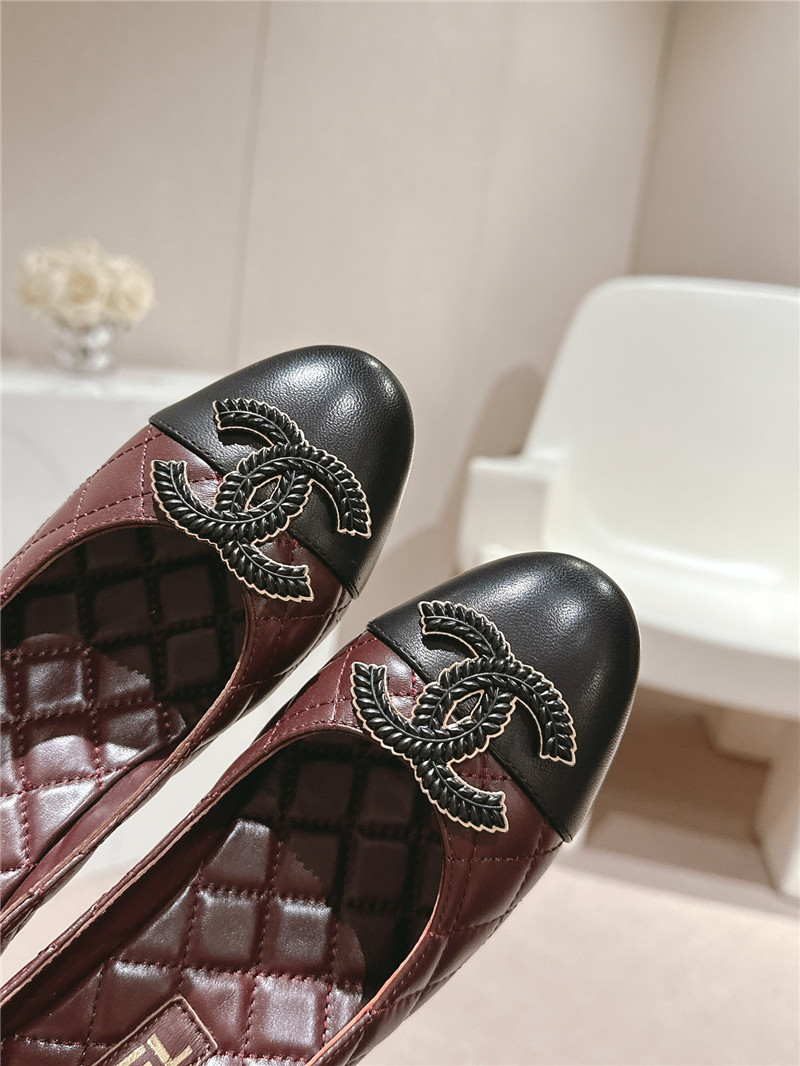 Ch**el burgundy/black quilted leather cap toe pumps