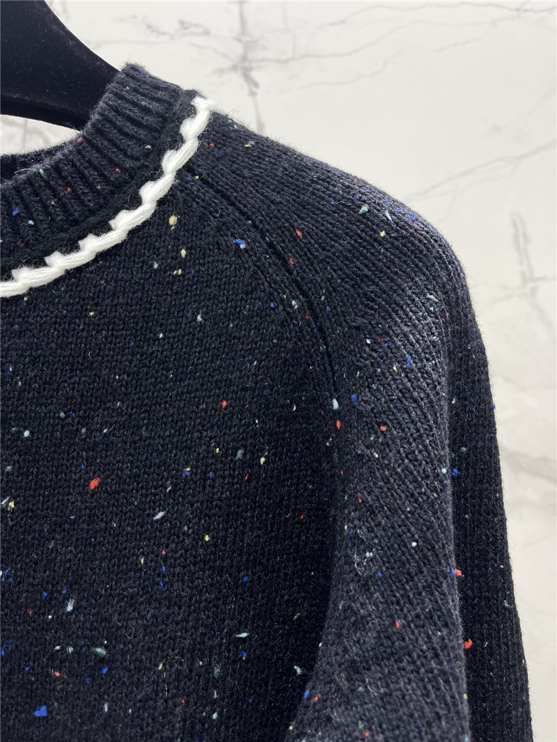 Ch**el white trim wool sweater black