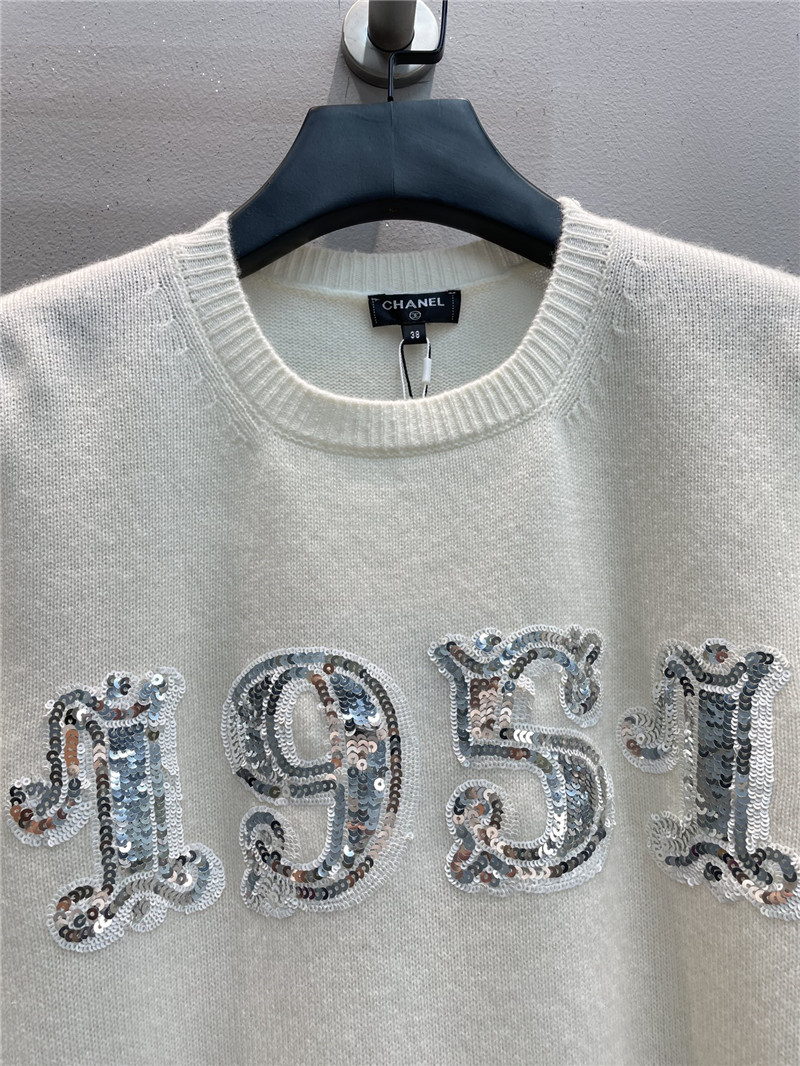 Ch**el sequin embroidered wool sweater in white