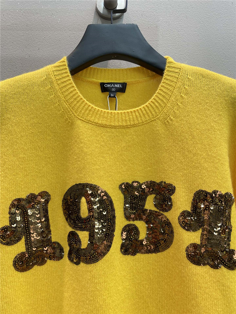 Ch**el sequin embroidered wool sweater in yellow