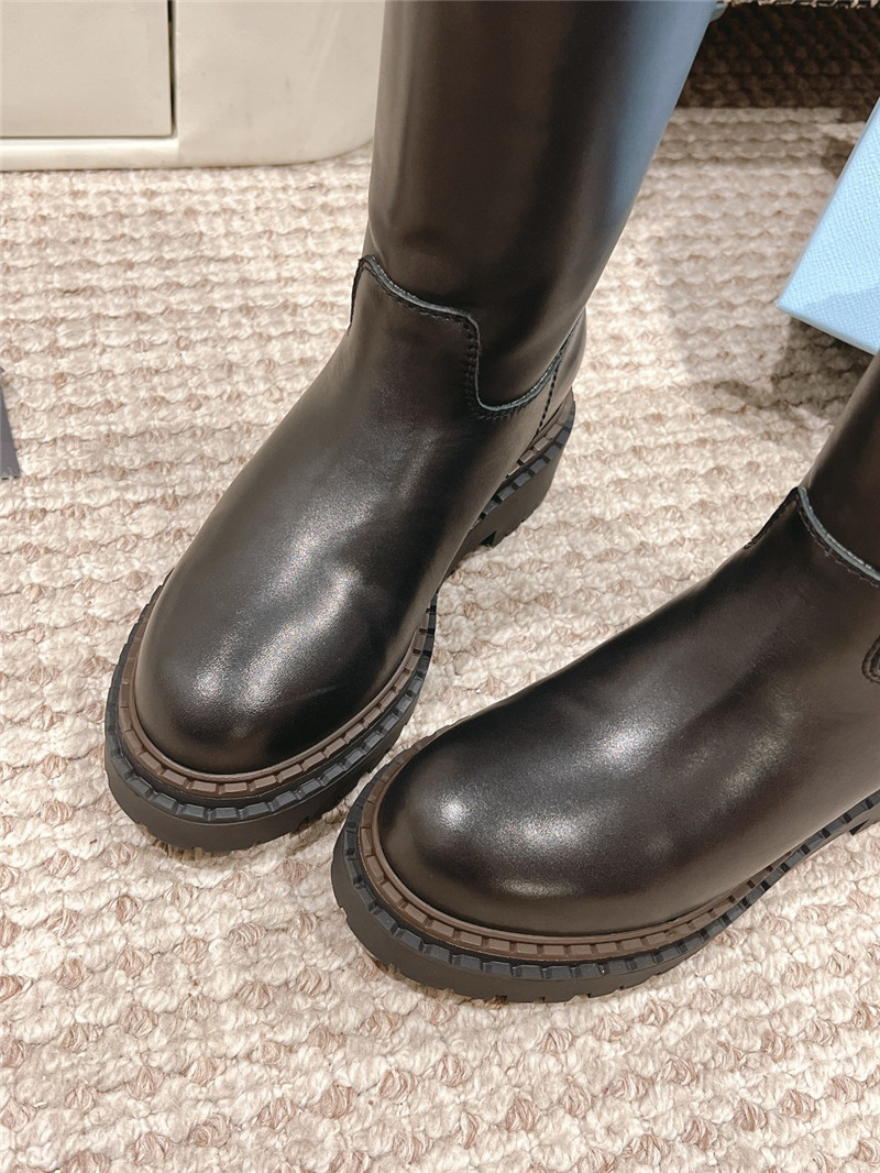 Pra*a women’s black shearling leather boots