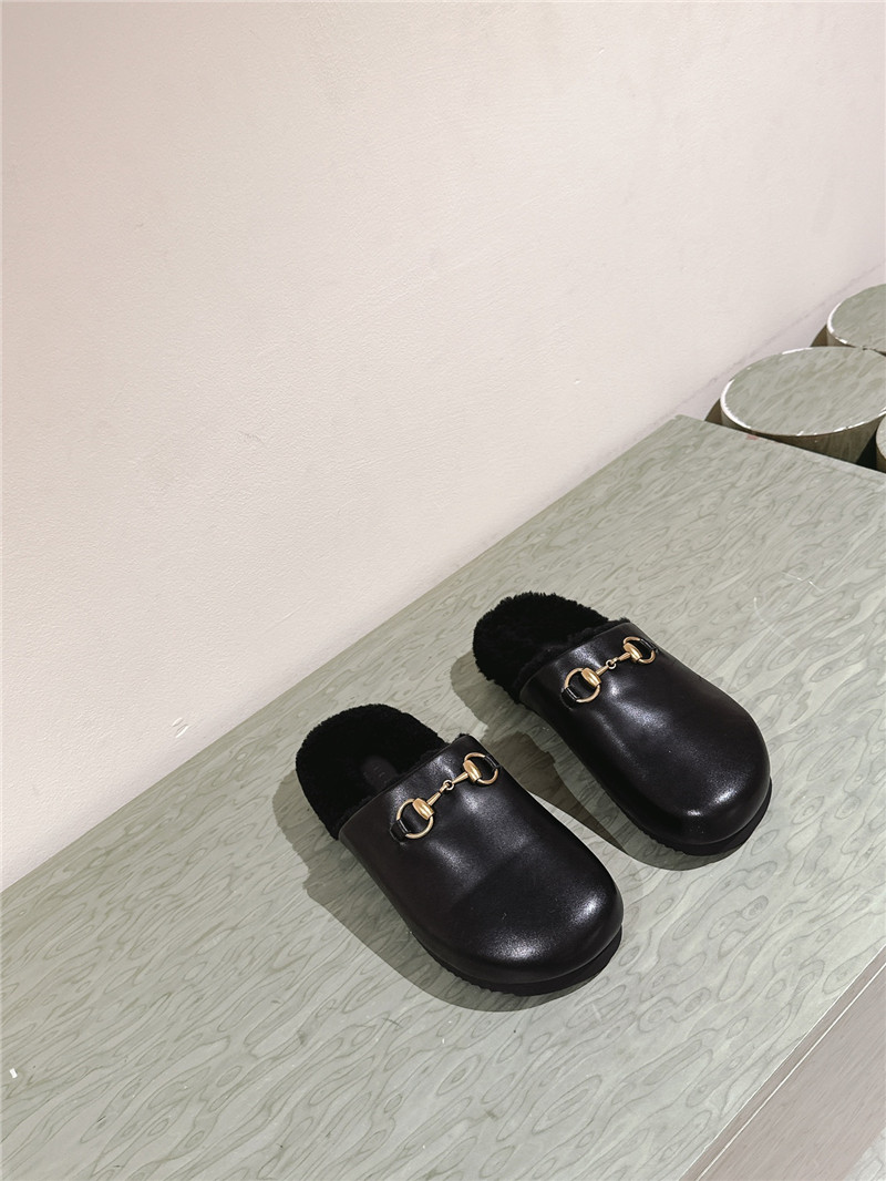 Gvc*1 wool horsebit mule in black leather