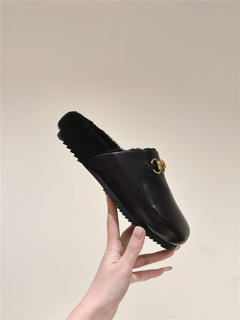 Gvc*1 wool horsebit mule in black leather