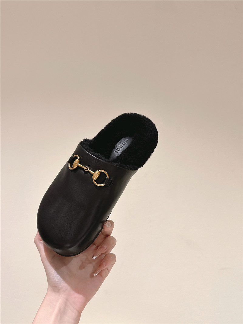 Gvc*1 wool horsebit mule in black leather