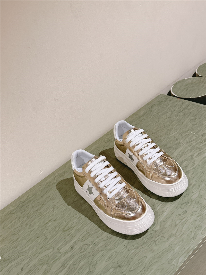 D10r gold star platform sneakers