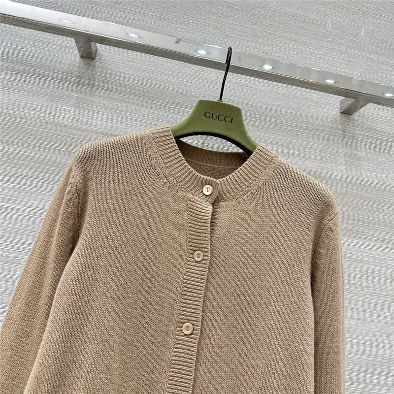 Gvc*1 beige cardigan with web finishes