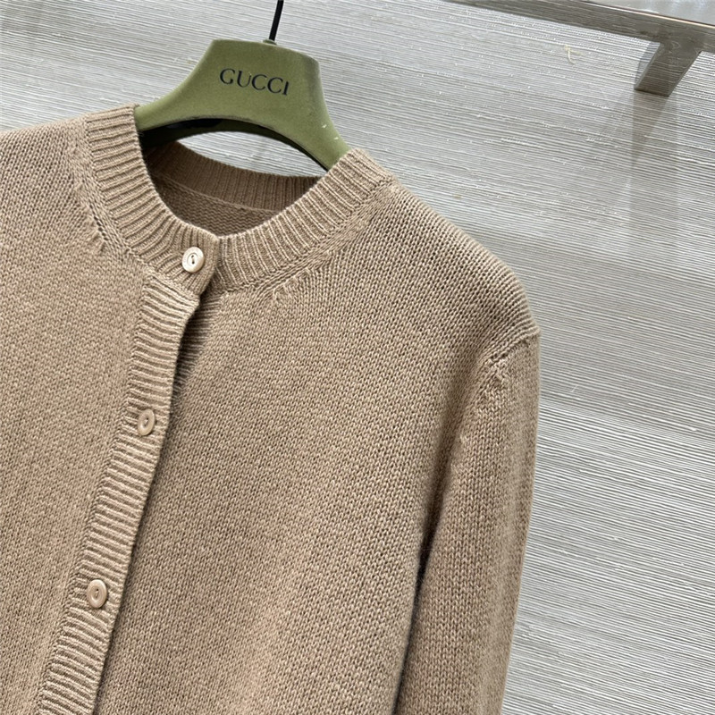 Gvc*1 beige cardigan with web finishes