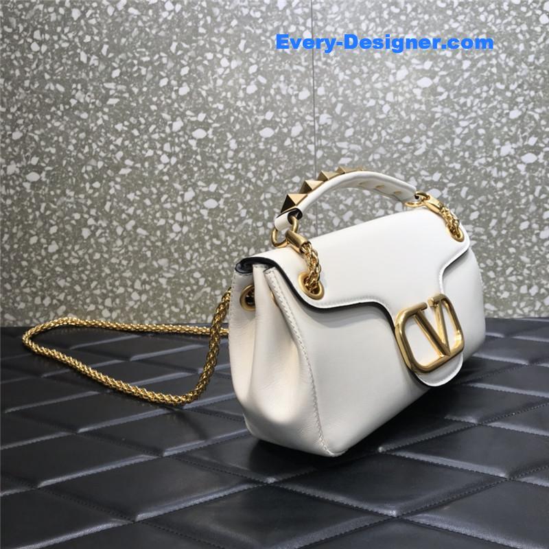 Va1e*ntin0 garavani stud sign leather shoulder bag