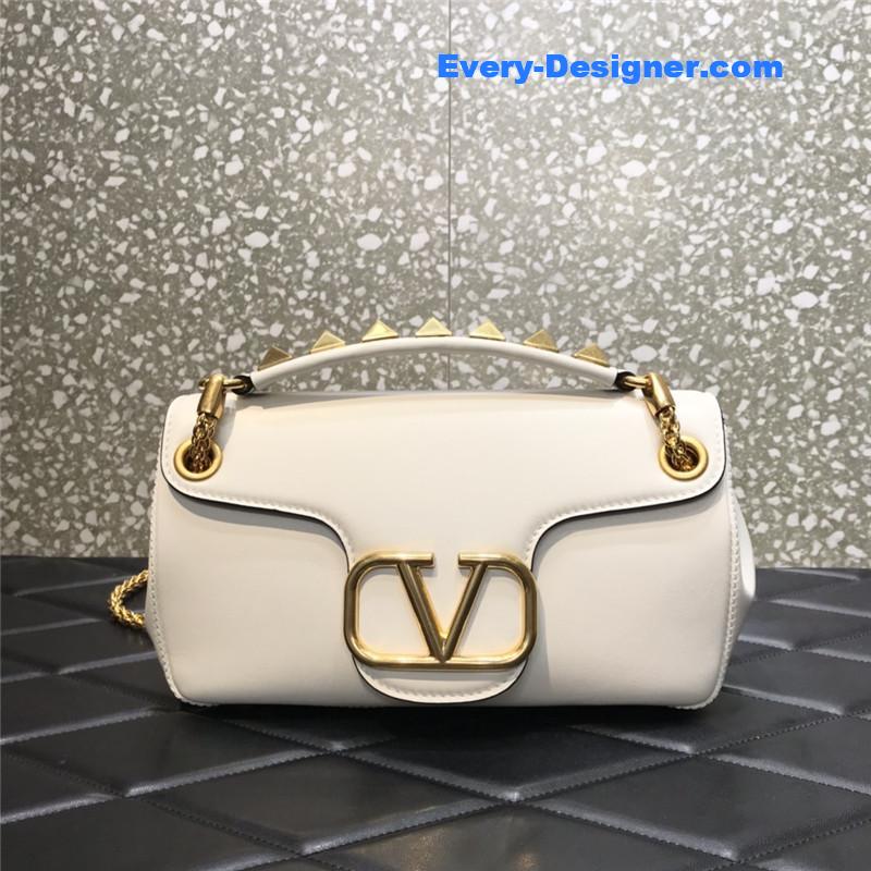 Va1e*ntin0 garavani stud sign leather shoulder bag