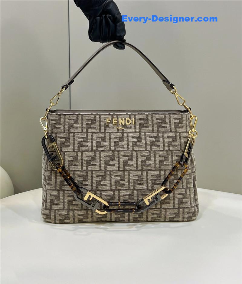 F**di o’clock clutch bag