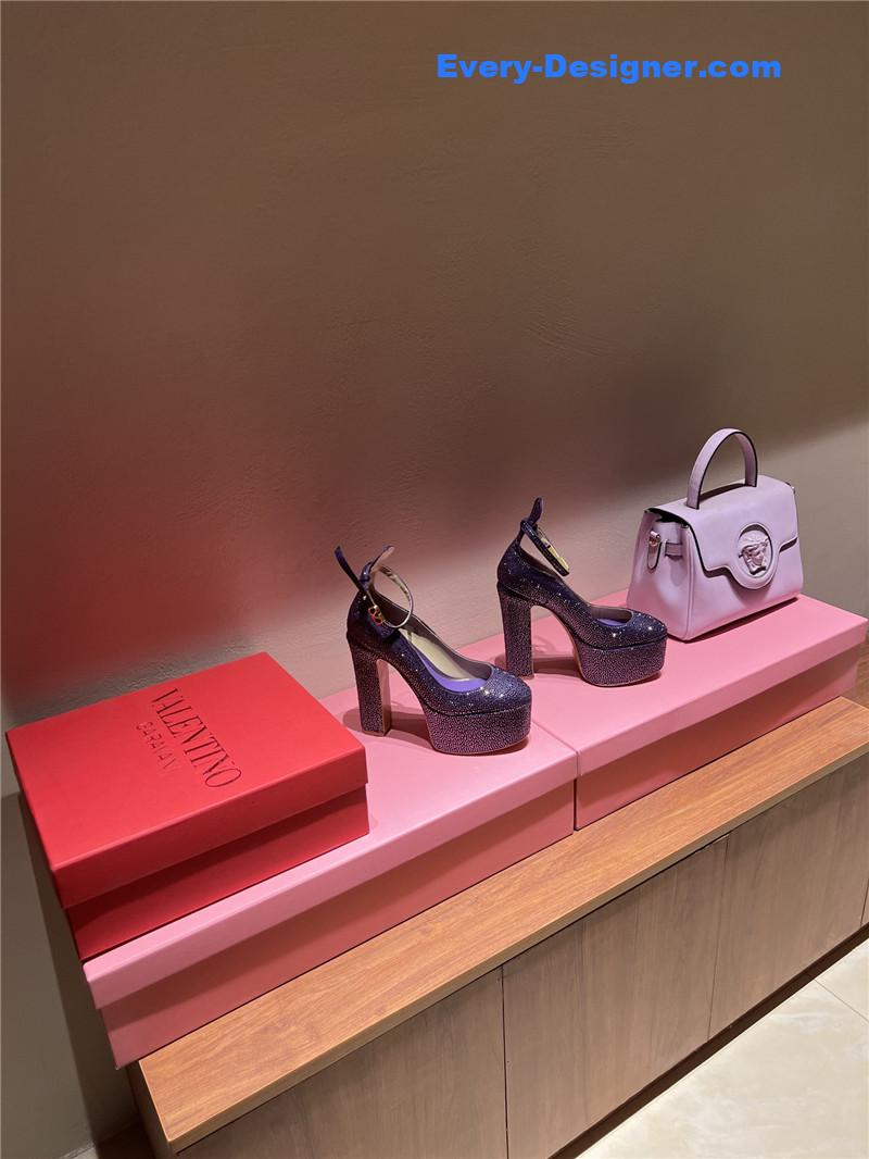 Va1e*ntin0 sky high platform pumps in patent leather