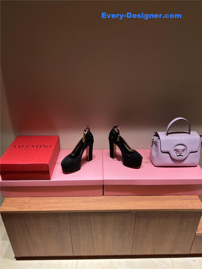 Va1e*ntin0 sky high platform pumps in patent leather