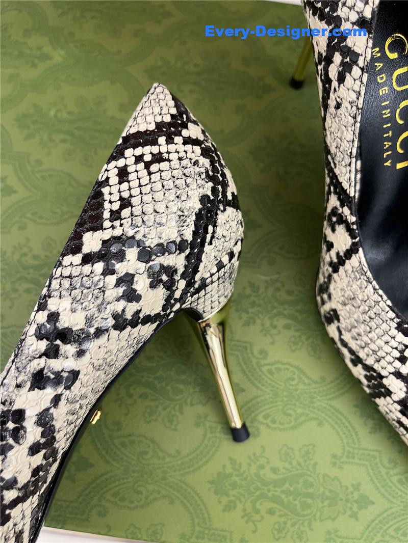 Gvc*1 metal heel pointed high heels