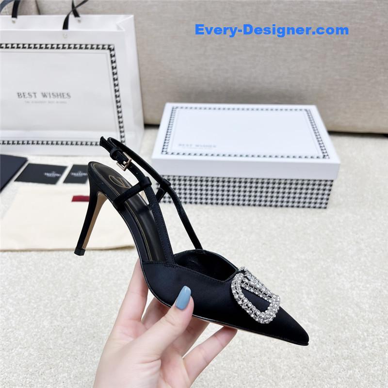 Va1e*ntin0 leather buckle pumps