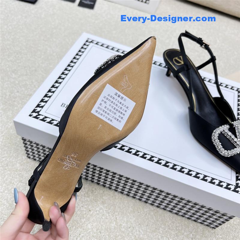 Va1e*ntin0 leather buckle pumps