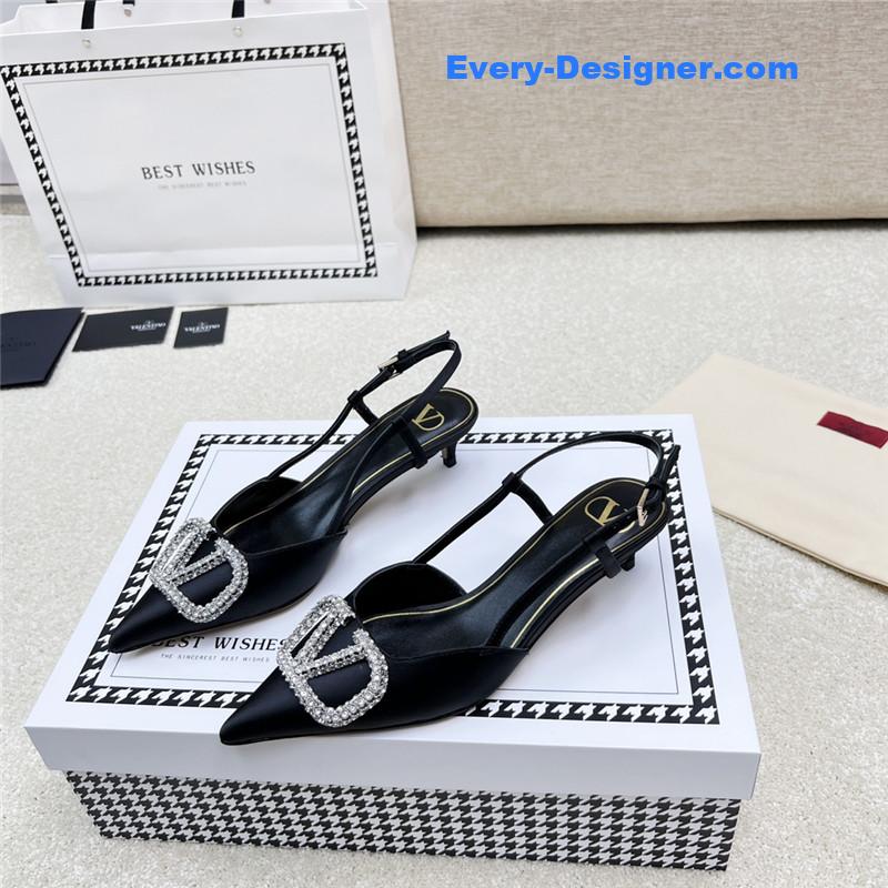 Va1e*ntin0 leather buckle pumps