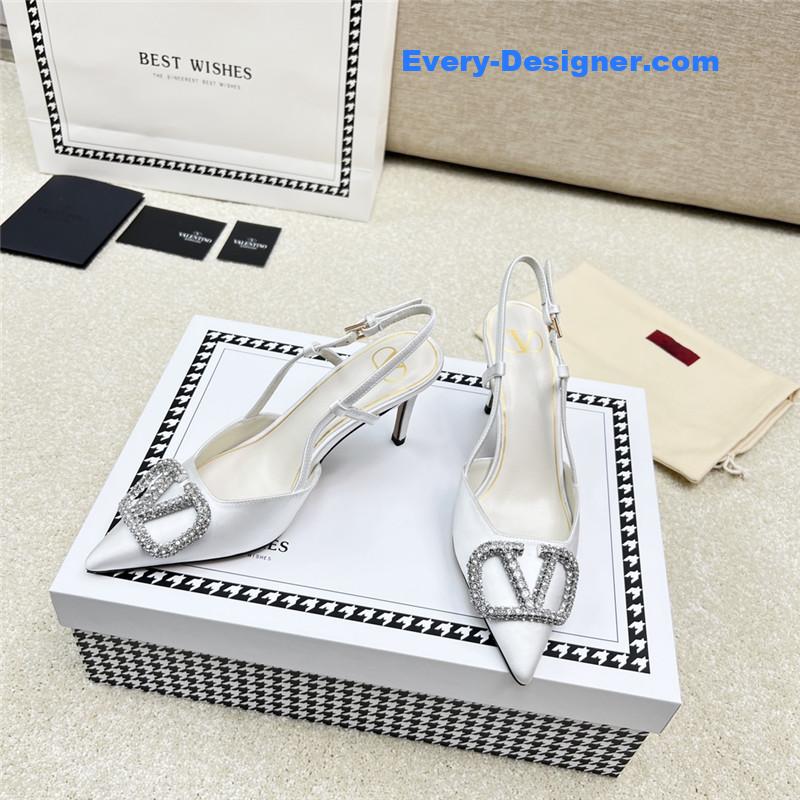 Va1e*ntin0 leather buckle pumps