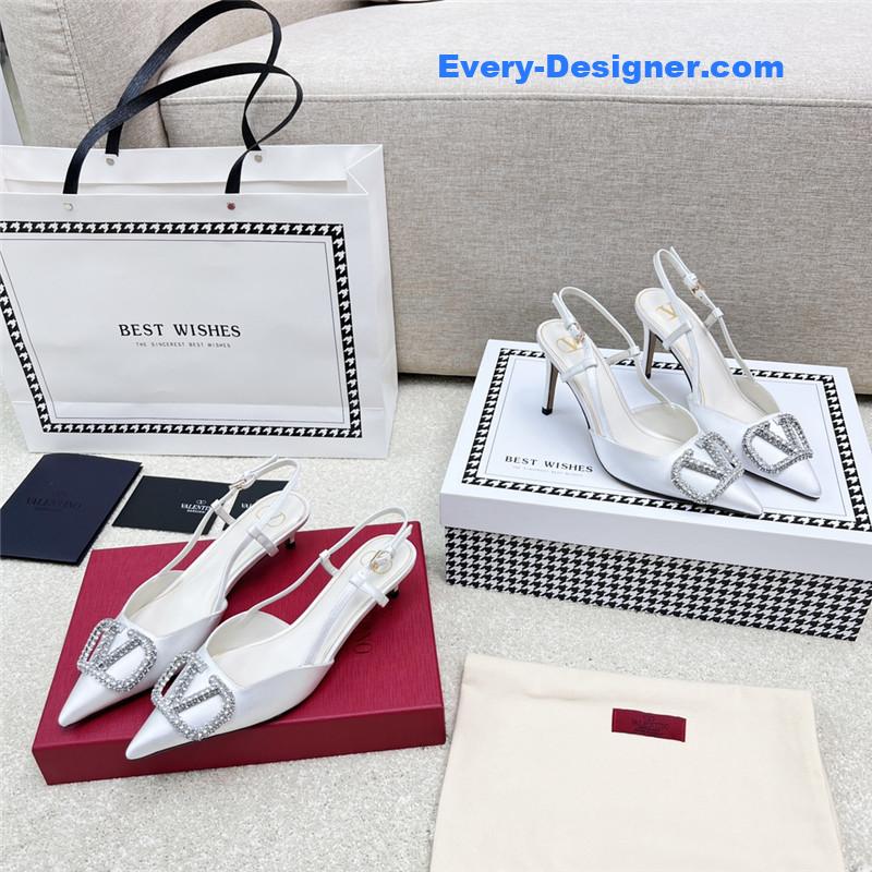 Va1e*ntin0 leather buckle pumps