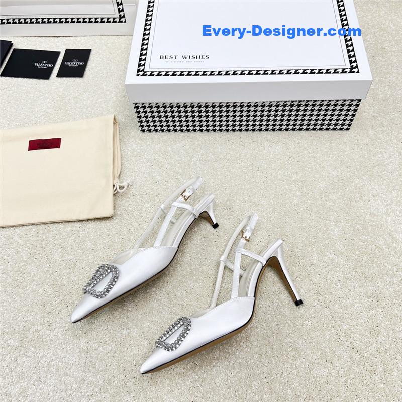 Va1e*ntin0 leather buckle pumps