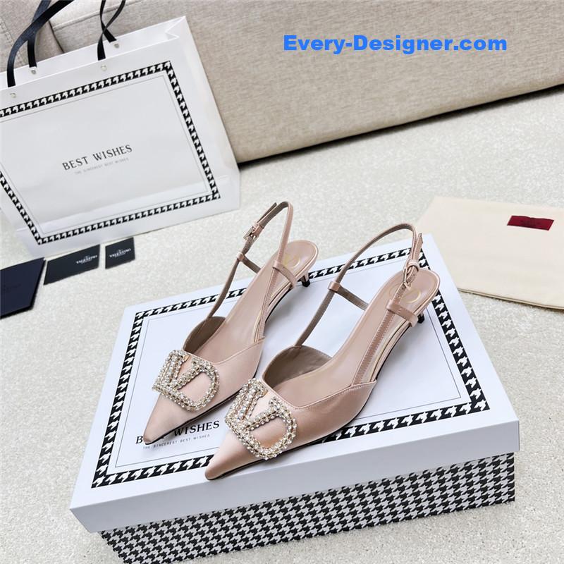 Va1e*ntin0 leather buckle pumps
