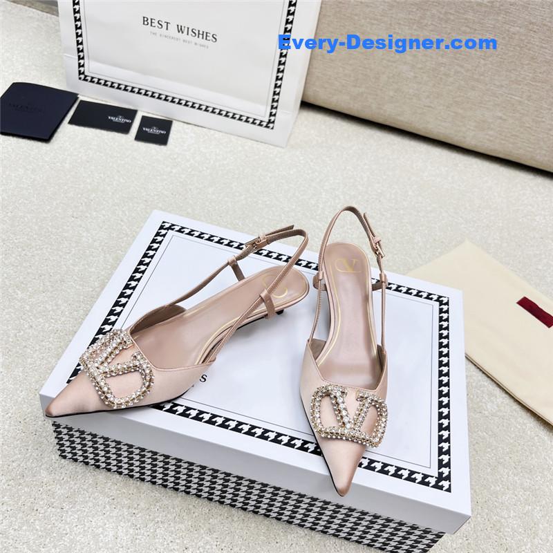Va1e*ntin0 leather buckle pumps