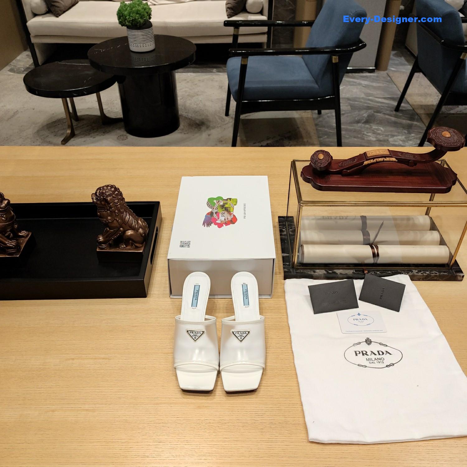 Pra*a metal logo triangle head square sandals