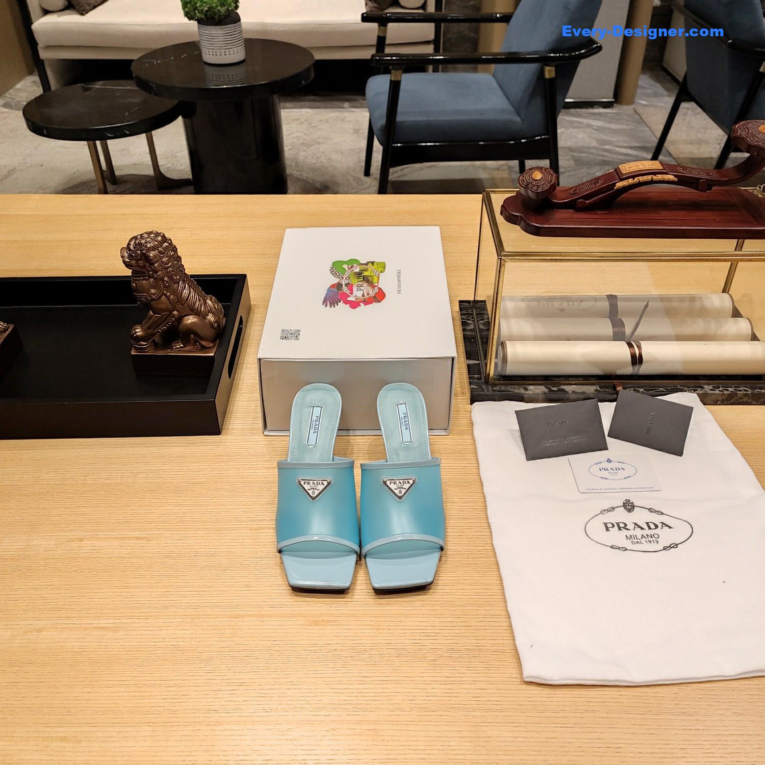 Pra*a metal logo triangle head square sandals