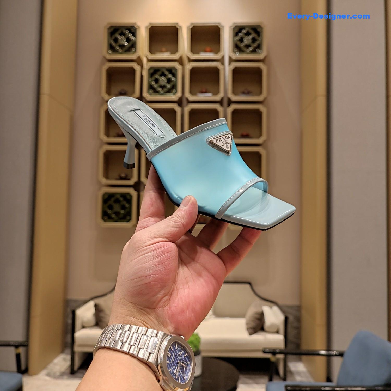 Pra*a metal logo triangle head square sandals