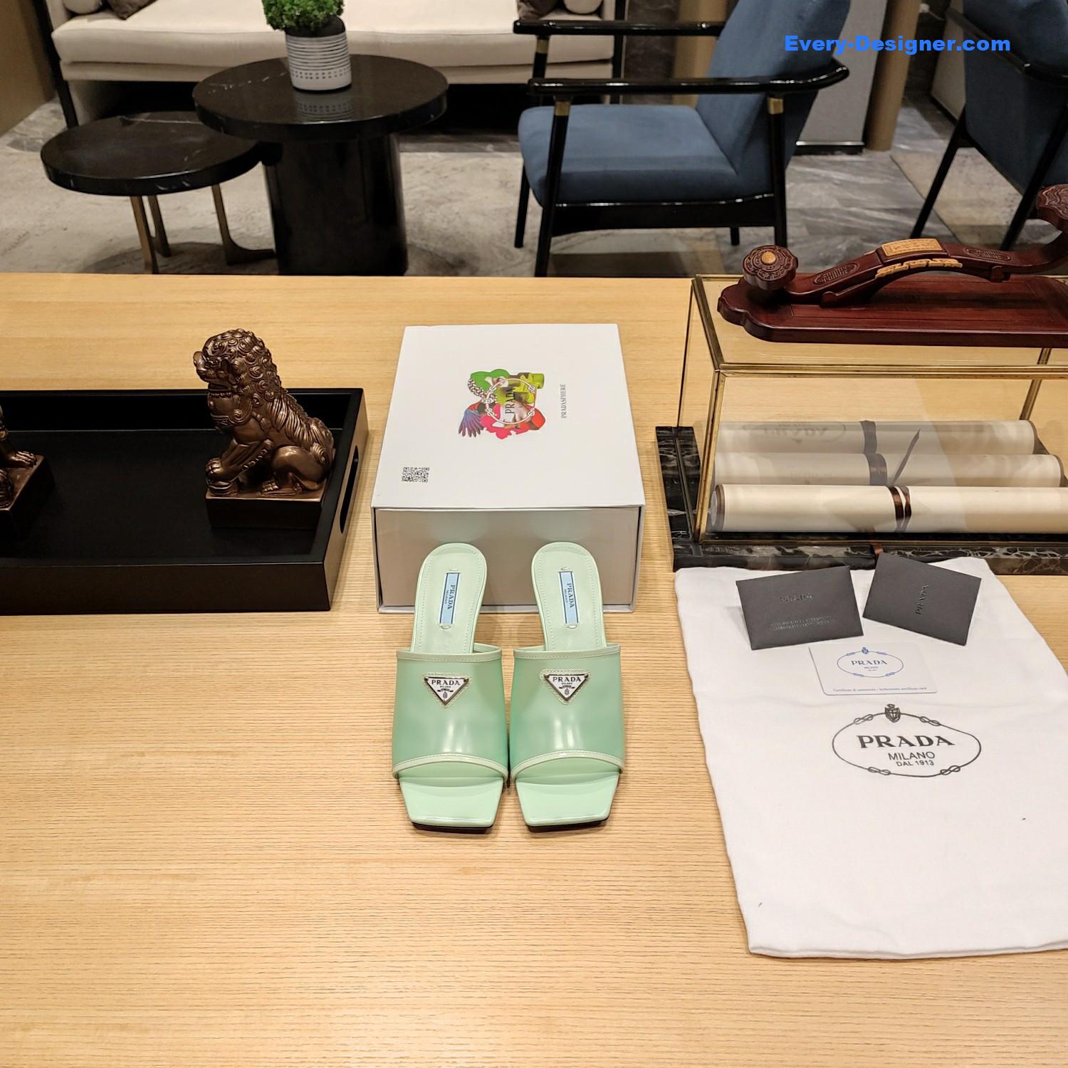 Pra*a metal logo triangle head square sandals