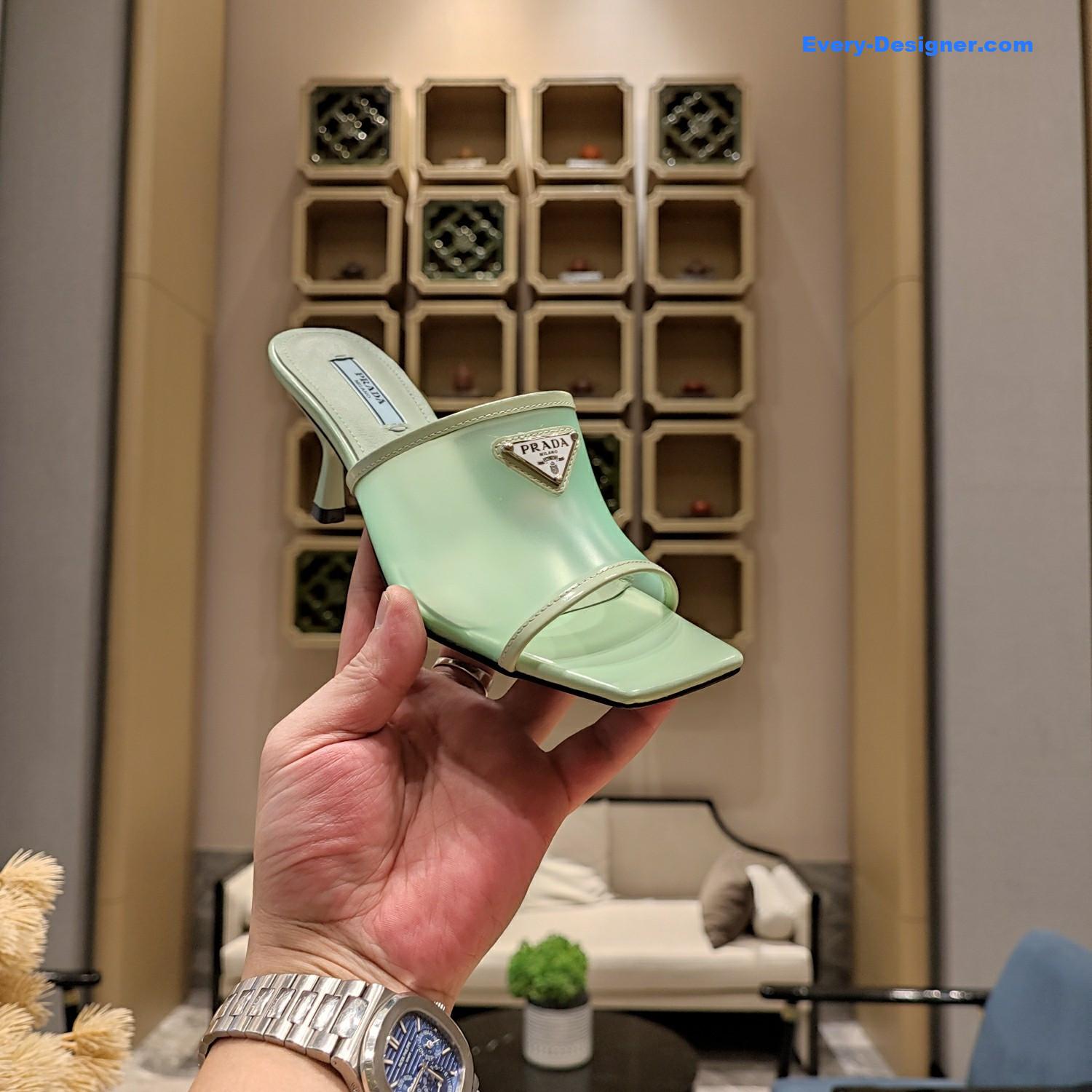 Pra*a metal logo triangle head square sandals