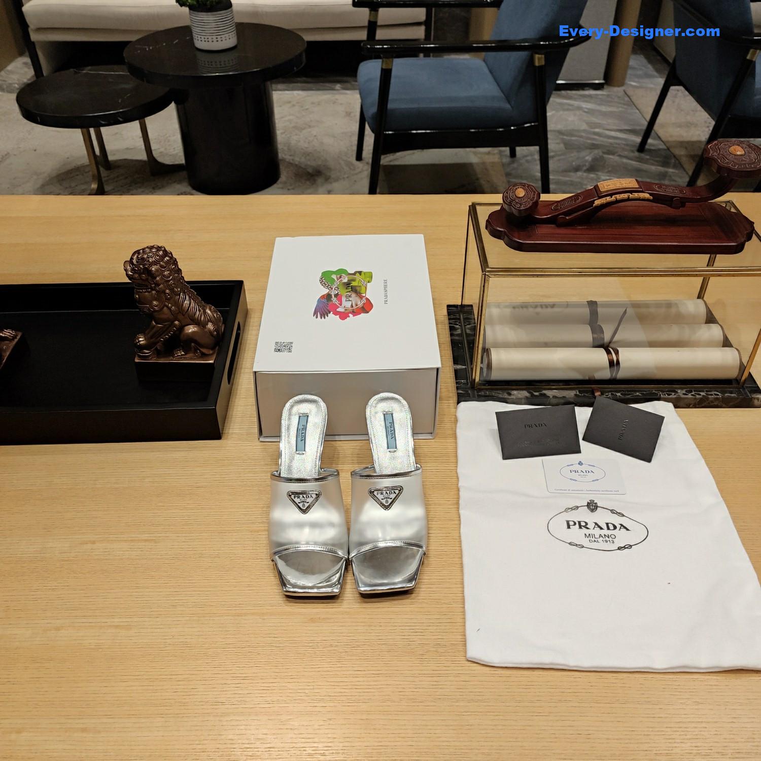 Pra*a metal logo triangle head square sandals