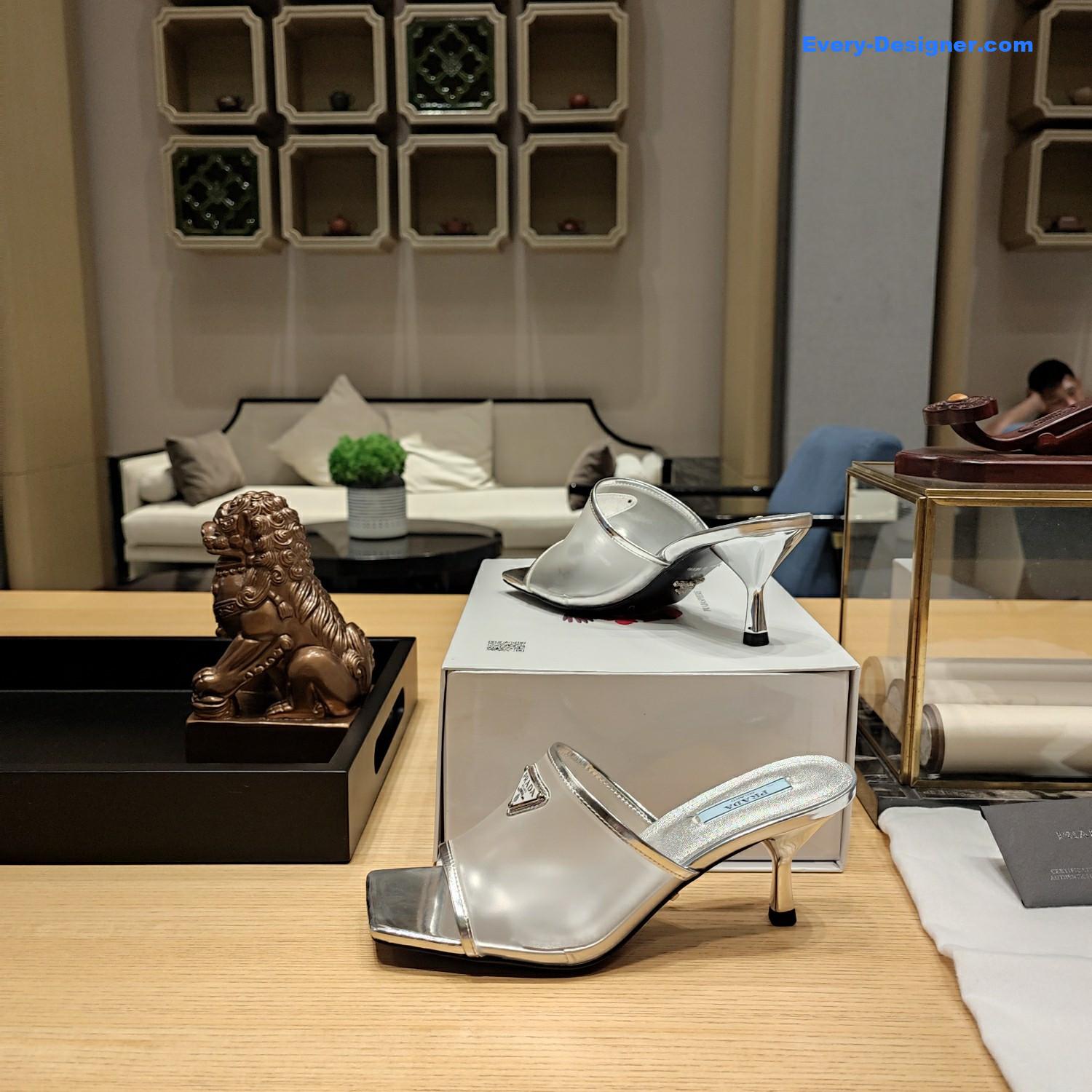 Pra*a metal logo triangle head square sandals