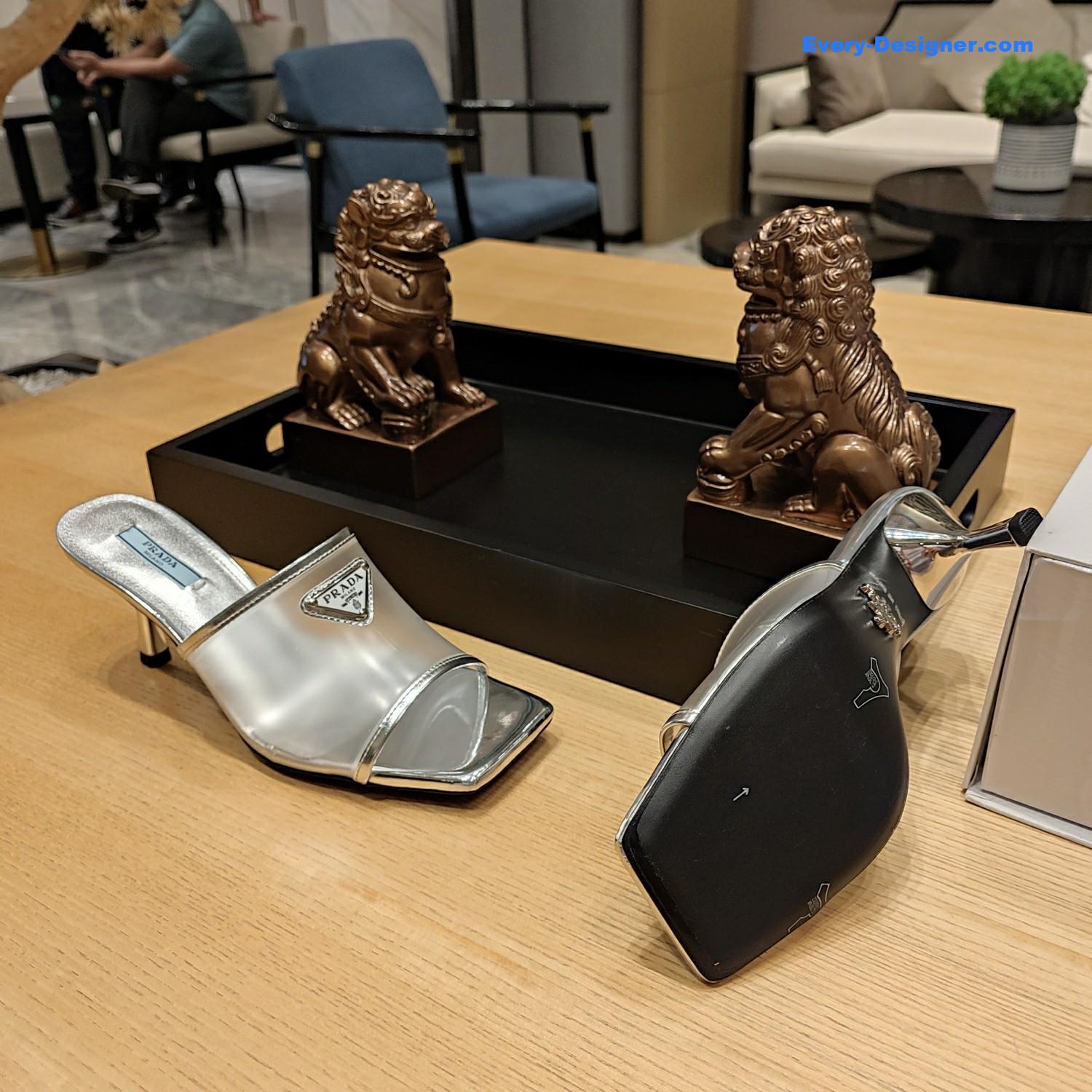 Pra*a metal logo triangle head square sandals