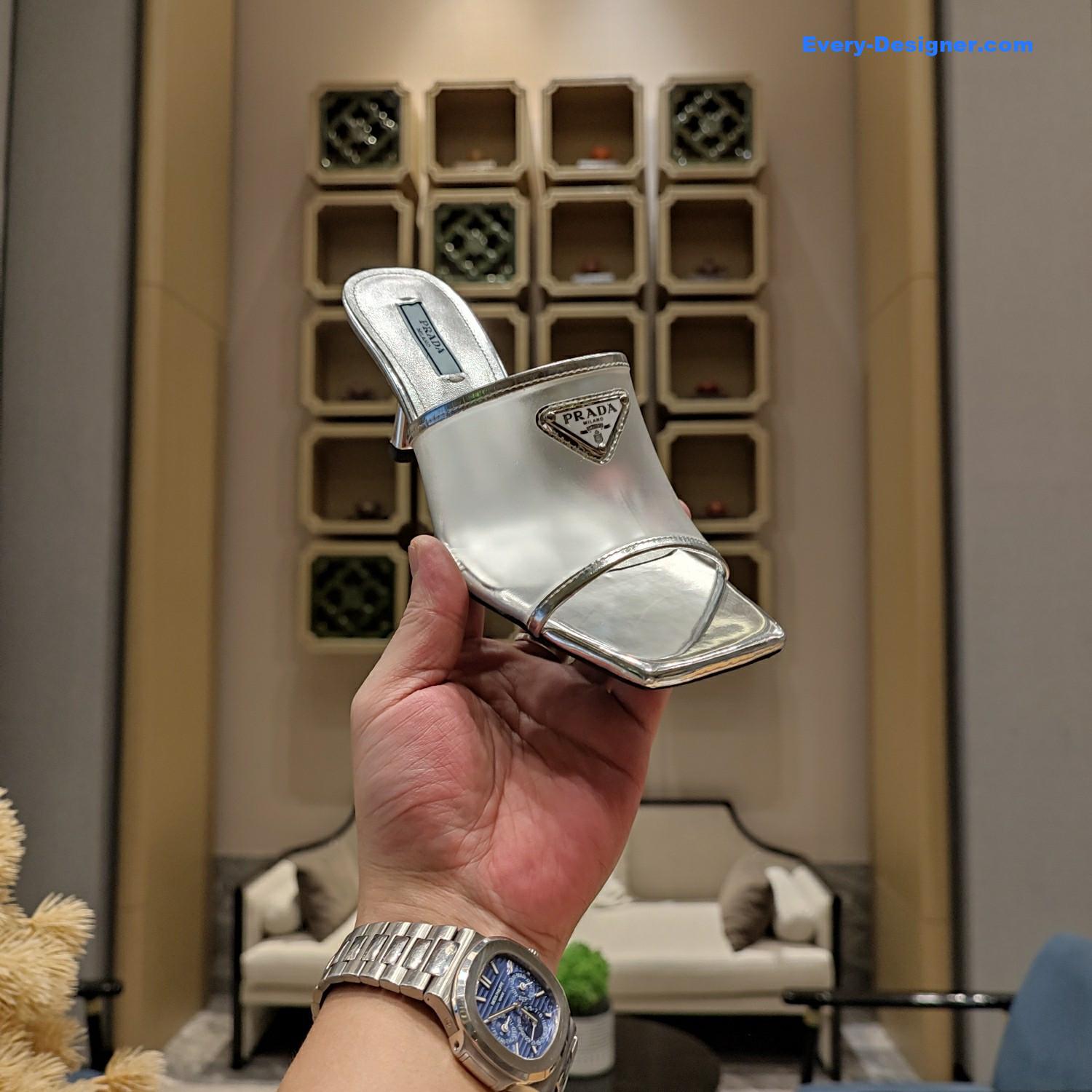 Pra*a metal logo triangle head square sandals