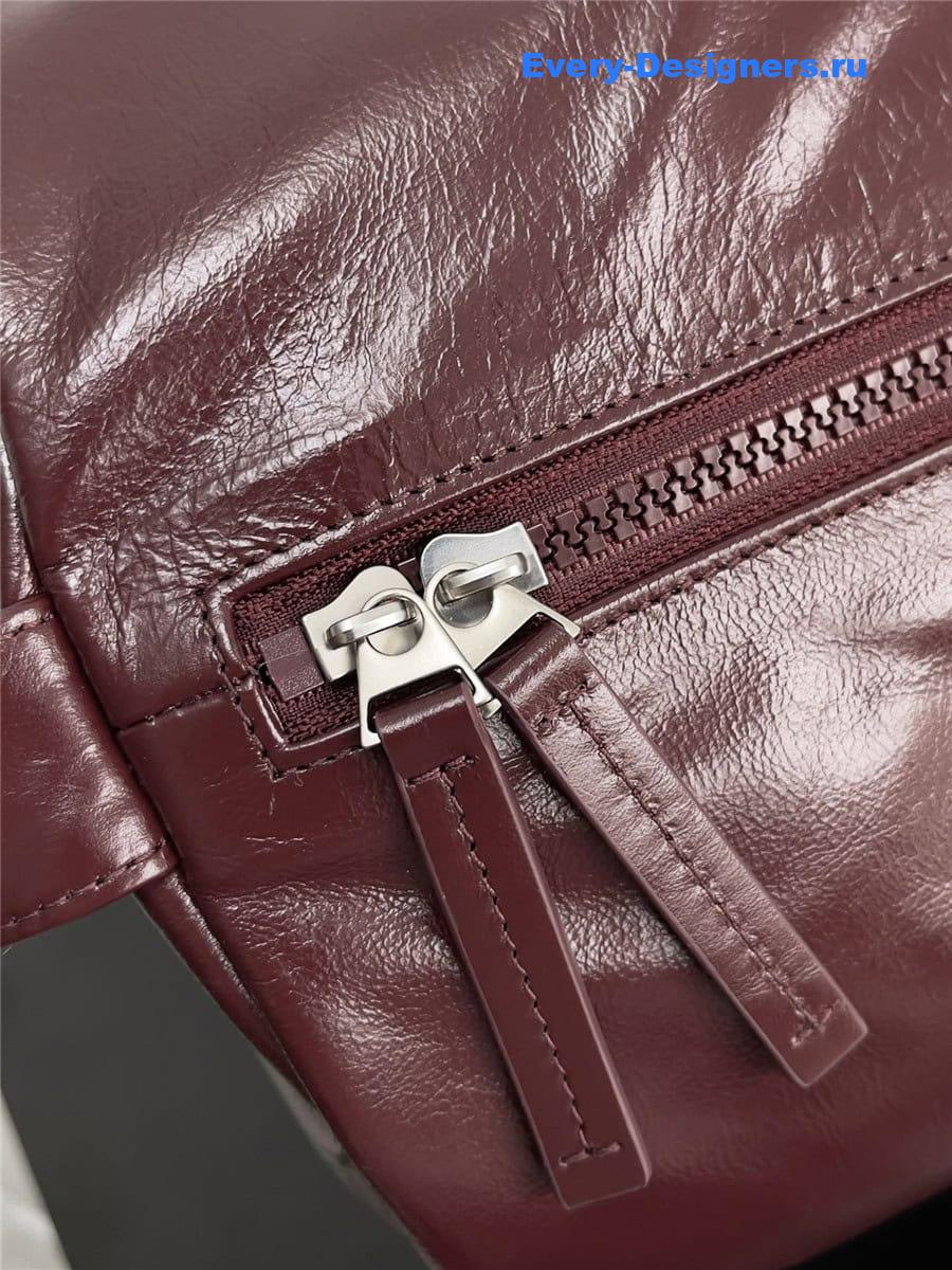 b0tt*ga Ven*ta wine red leather travel bag
