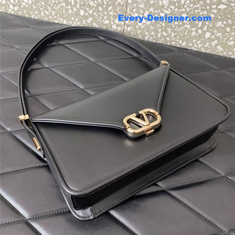 Va1e*ntin0 garavani letter leather shoulder bag