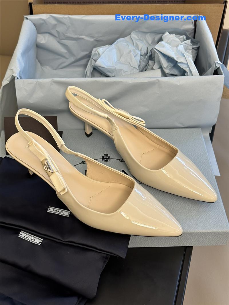 Pra*a paneled satin bow pumps