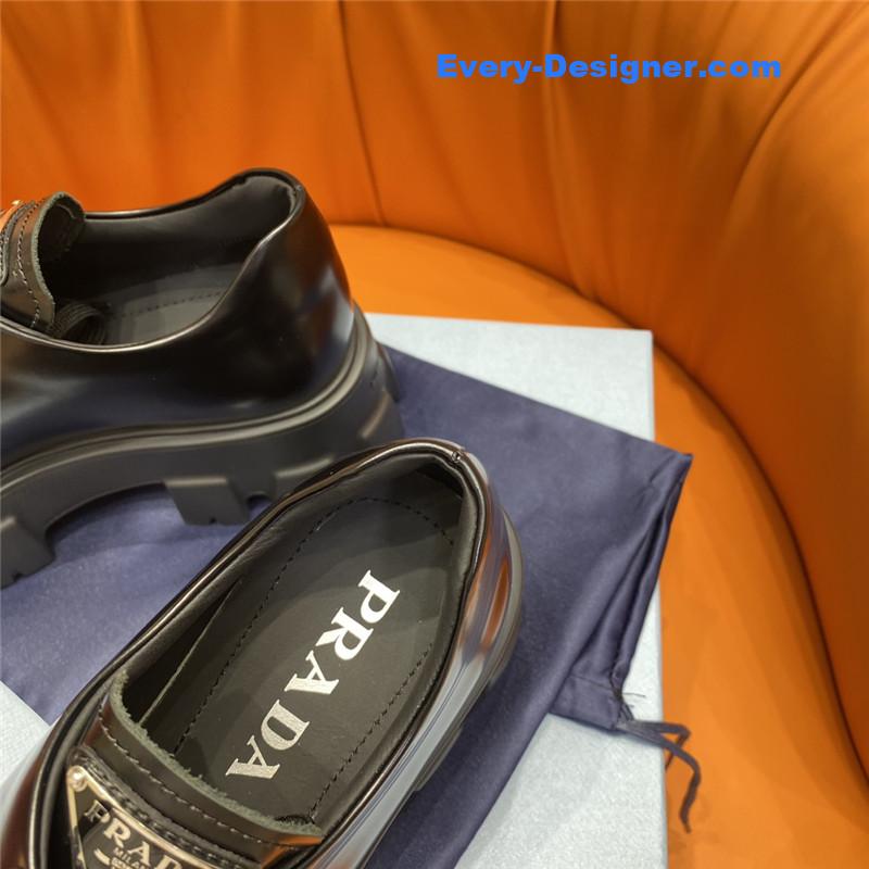 Pra*a triangle logo lace-up loafers