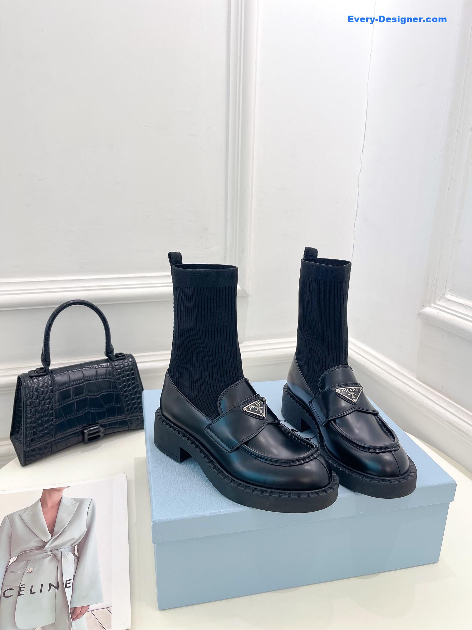 Pra*a catwalk style thick-soled triangle logo socks ankle boots