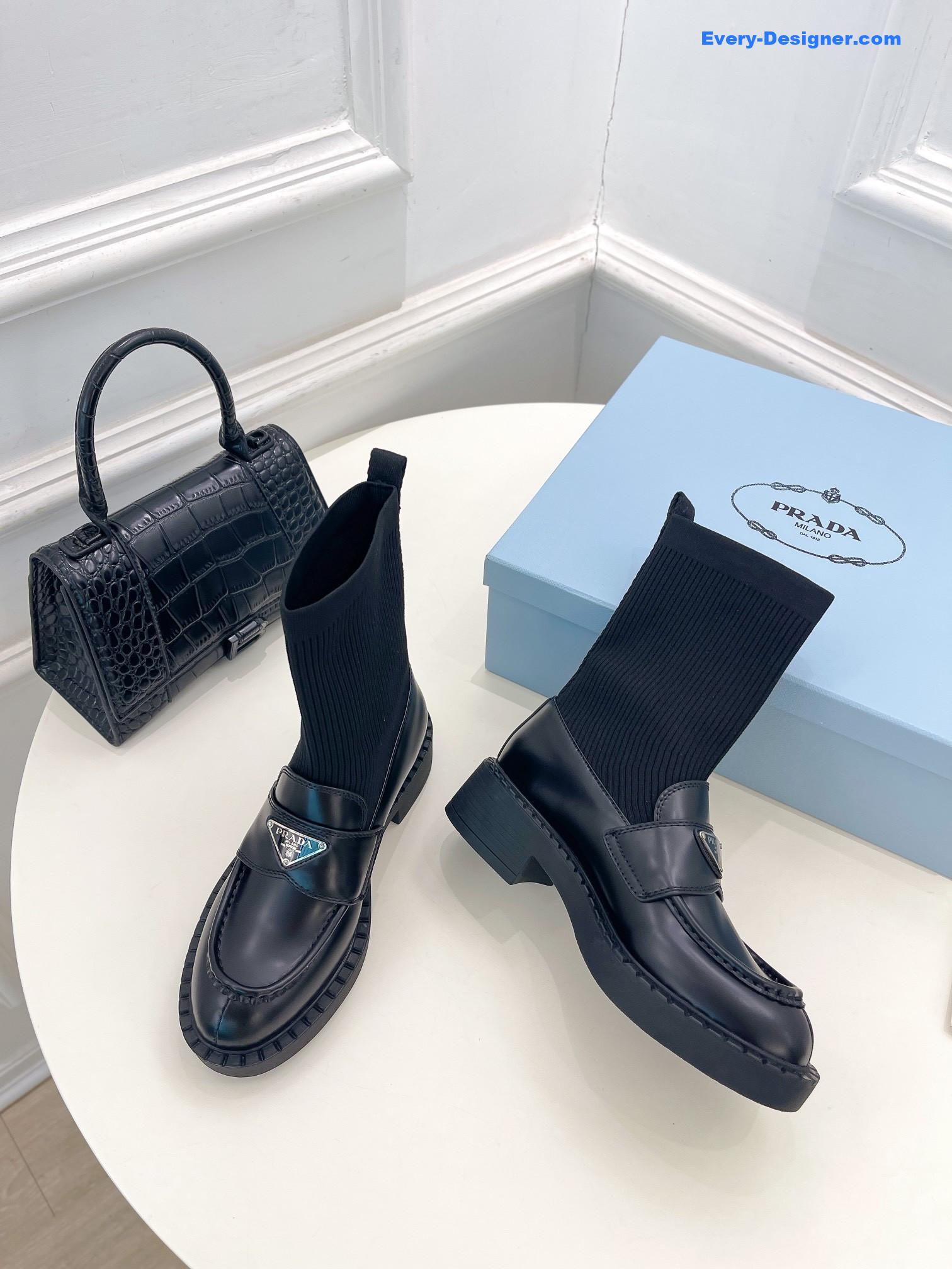 Pra*a catwalk style thick-soled triangle logo socks ankle boots