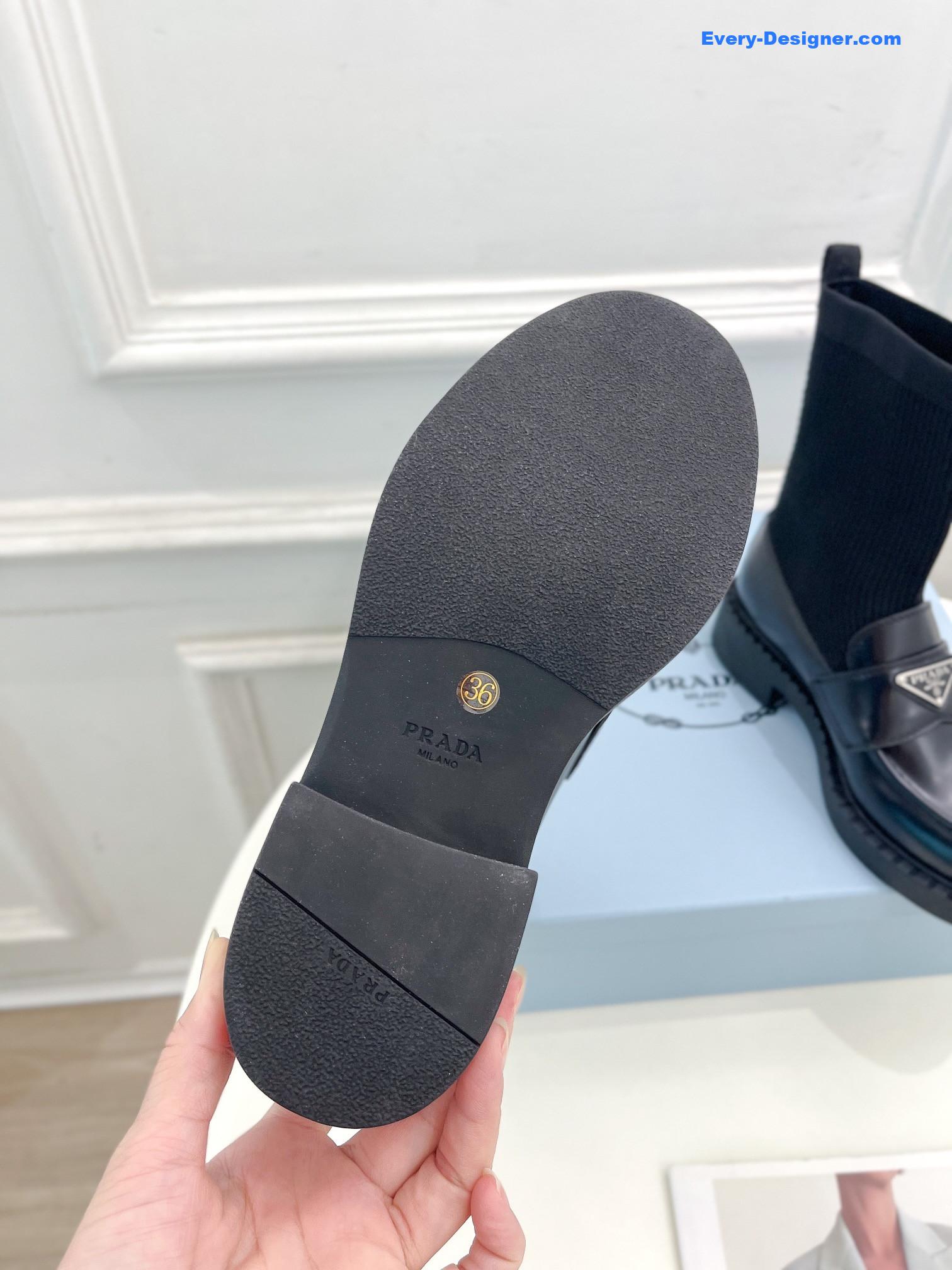 Pra*a catwalk style thick-soled triangle logo socks ankle boots