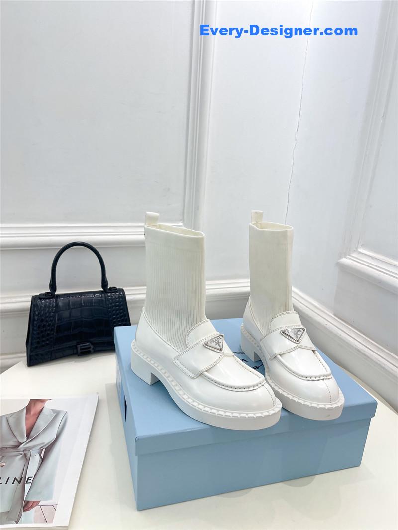 Pra*a catwalk style thick-soled triangle logo socks ankle boots